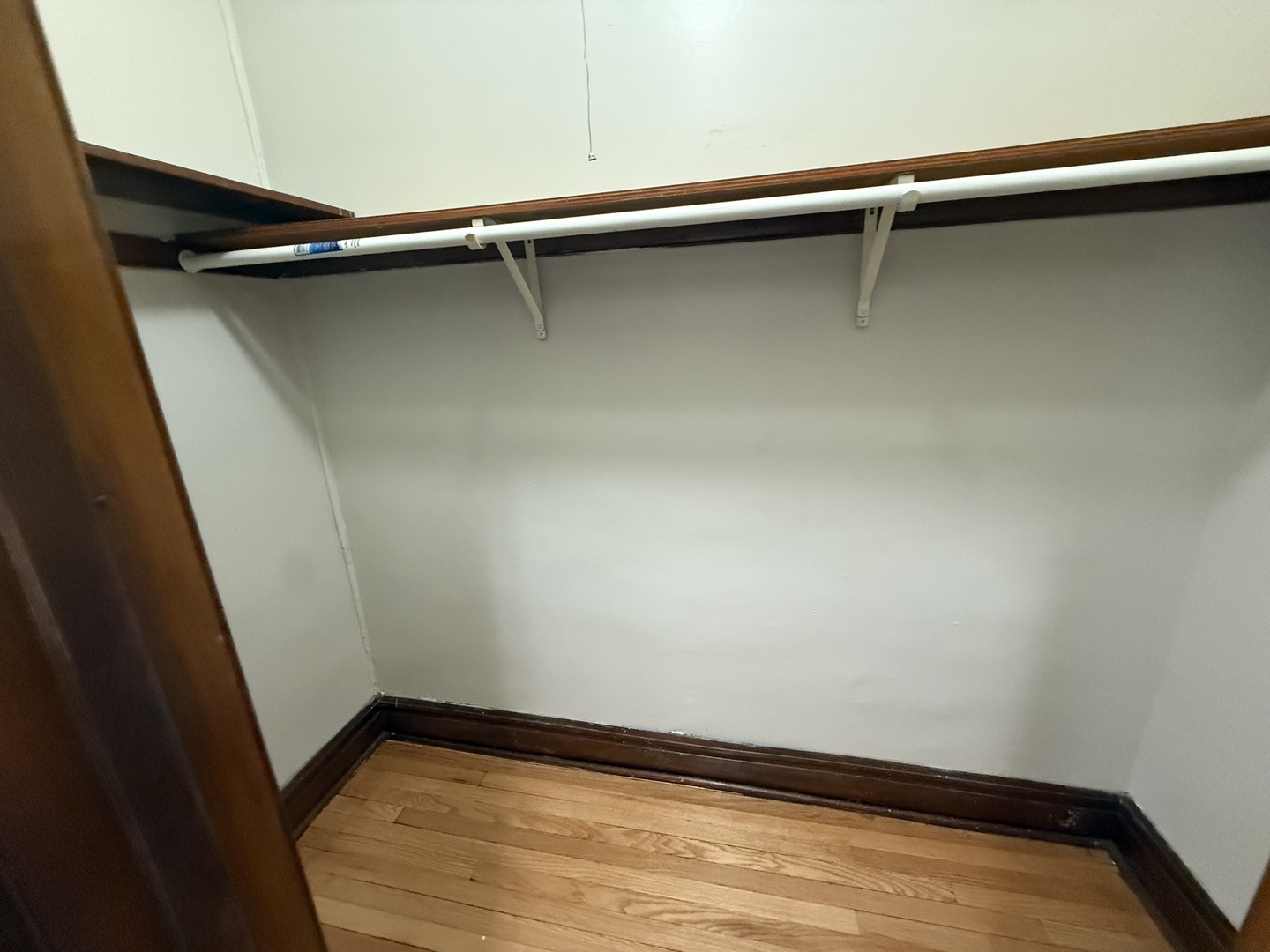6829 21st Street, Unit 2E Berwyn, IL 60402 - Photo 12 of 15 a view of a room with racks on the wall