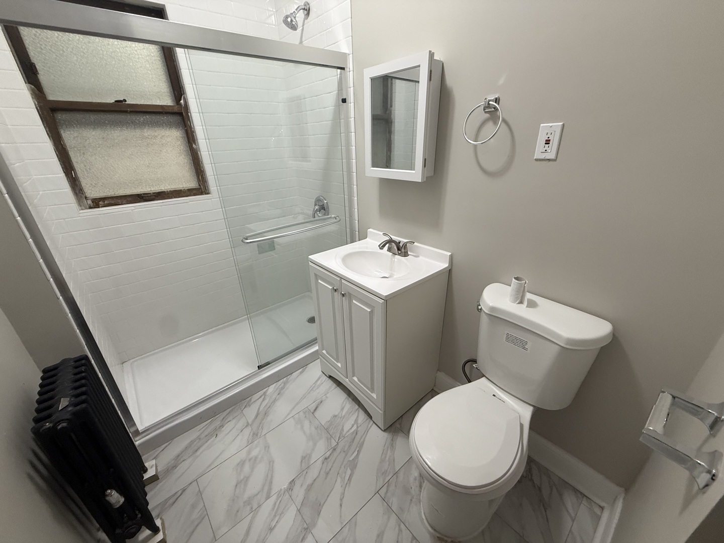 6829 21st Street, Unit 2E Berwyn, IL 60402 - Photo 13 of 15 a bathroom with a toilet and a shower