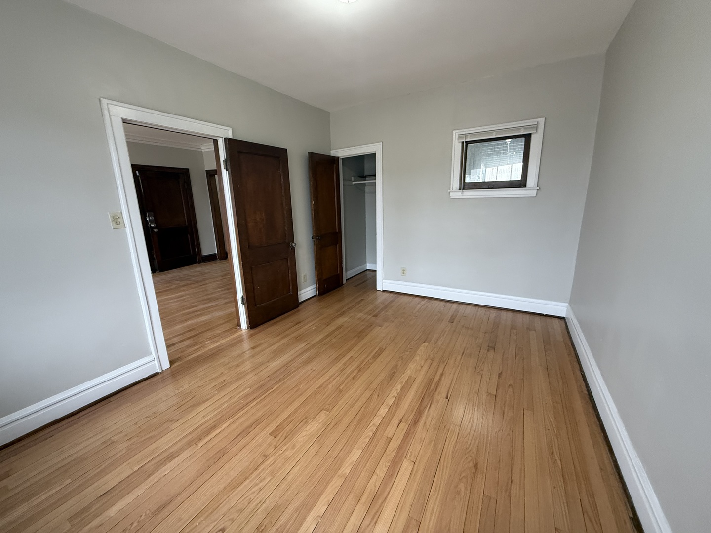 6829 21st Street, Unit 2E Berwyn, IL 60402 - Photo 5 of 15 a view of wooden floor in an empty room