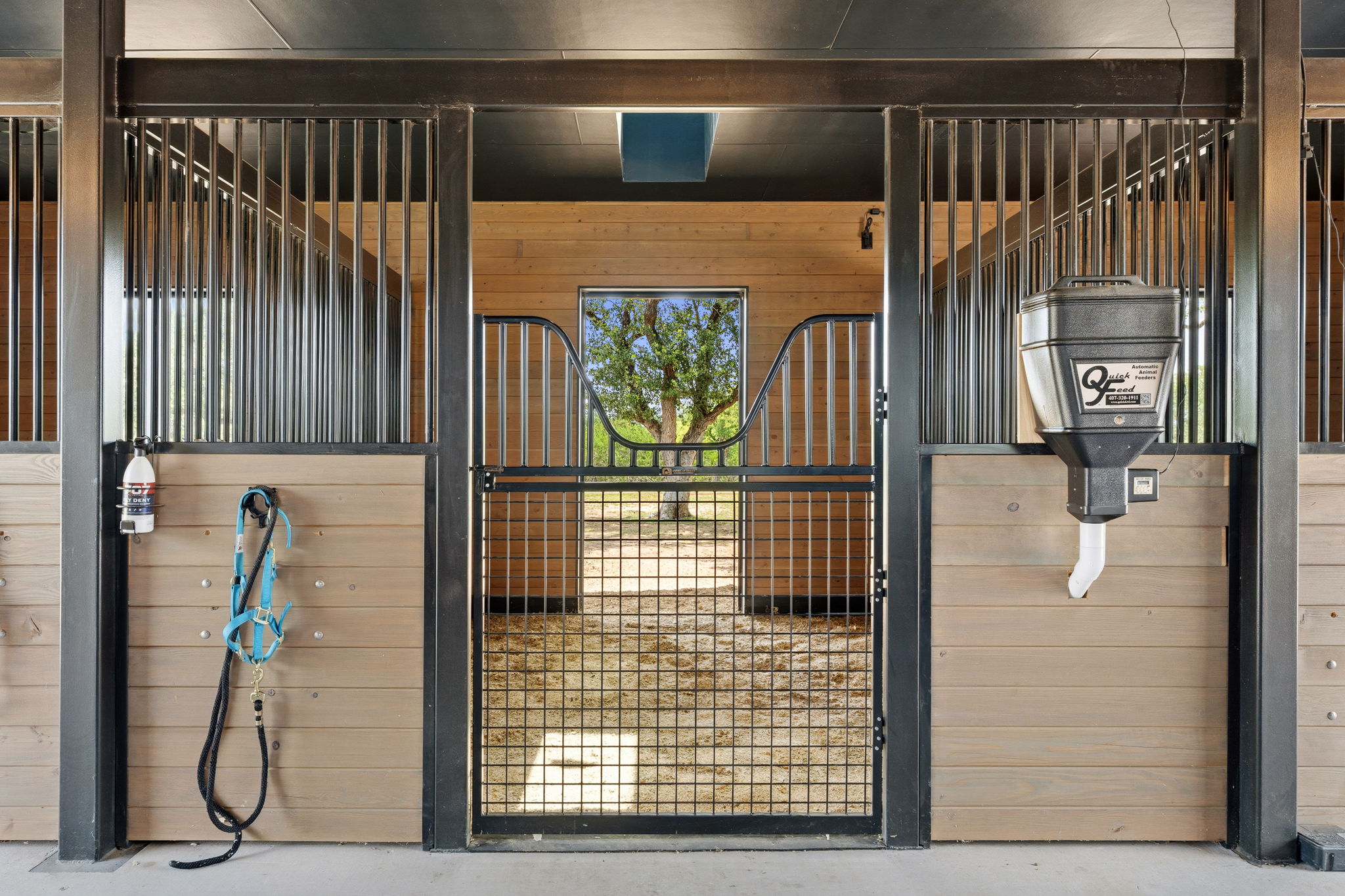475 Happy Trail Dripping Springs, TX 78620 - Photo 38 of 40 Premium equestrian facility with a modern, well-maintained stable ready for occupancy.