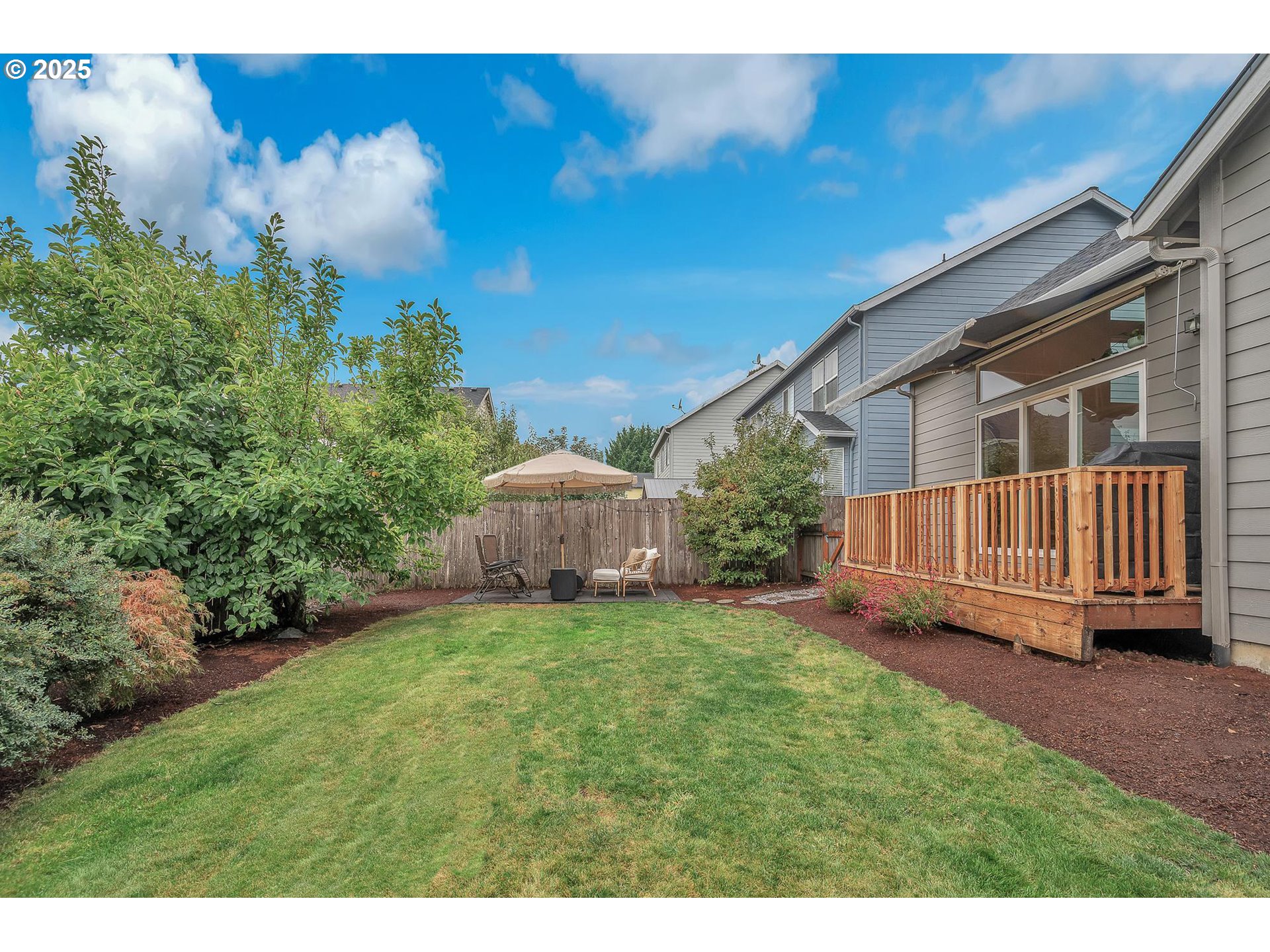 35120 Burt Road St. Helens, OR 97051 - Photo 19 of 27 a view of a house with a yard and deck