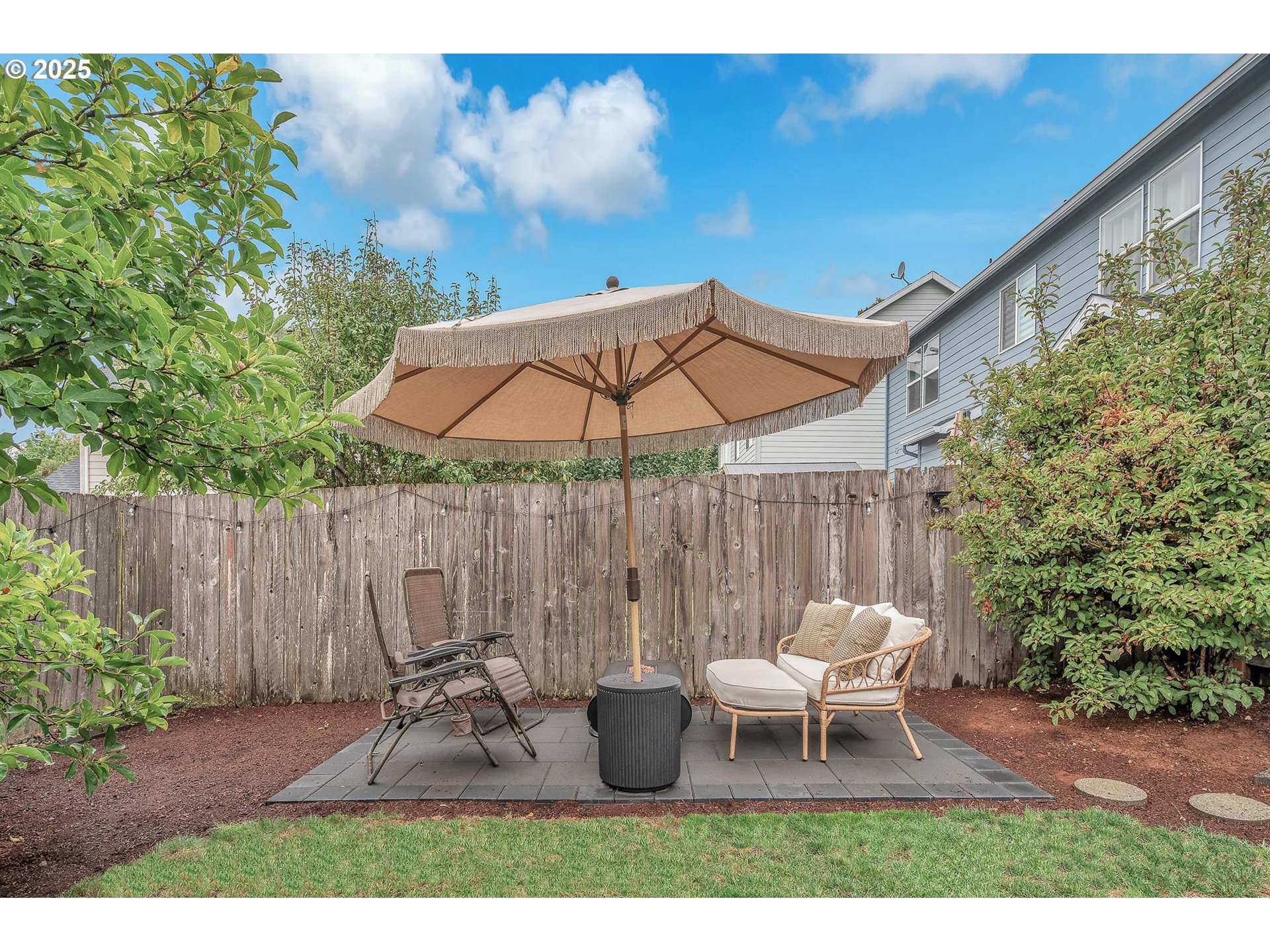 35120 Burt Road St. Helens, OR 97051 - Photo 20 of 27 a chair and table sitting in patio with a umbrella