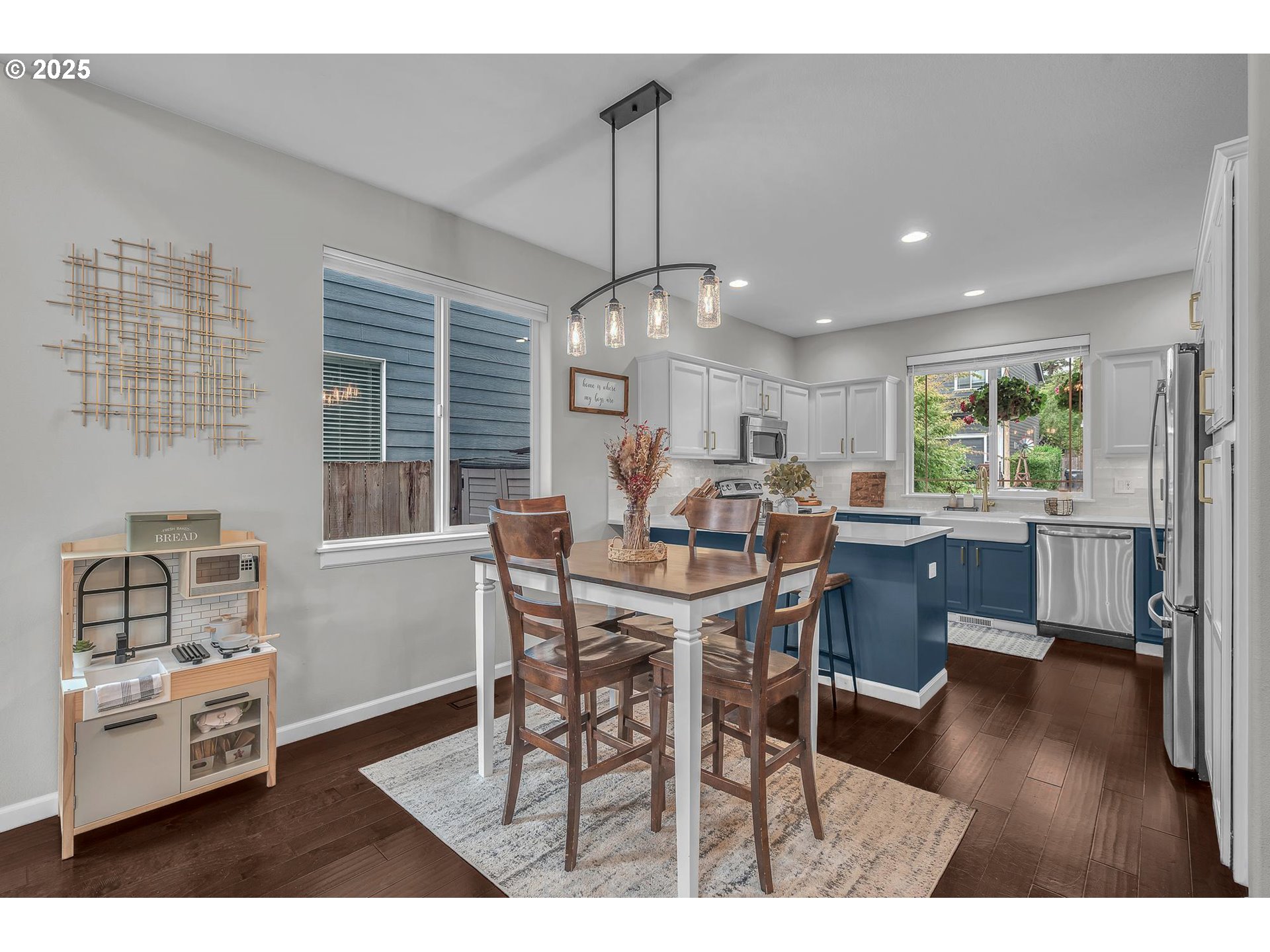 35120 Burt Road St. Helens, OR 97051 - Photo 7 of 27 a view of a dining room with furniture window and wooden floor