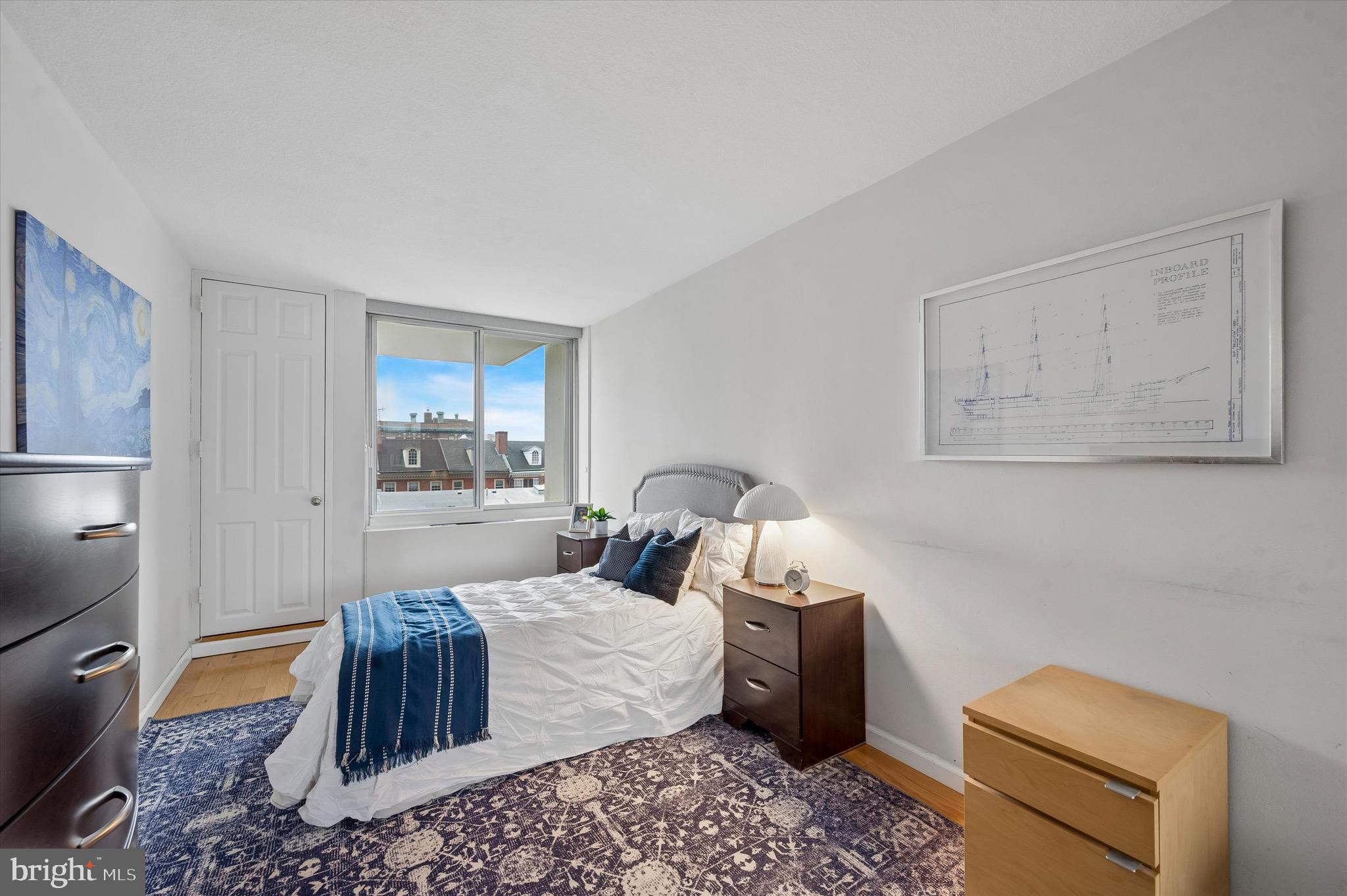 604 South Washington Square, Unit 309 Philadelphia, PA 19106 - Photo 11 of 28 a bedroom with a bed and a view of bathroom
