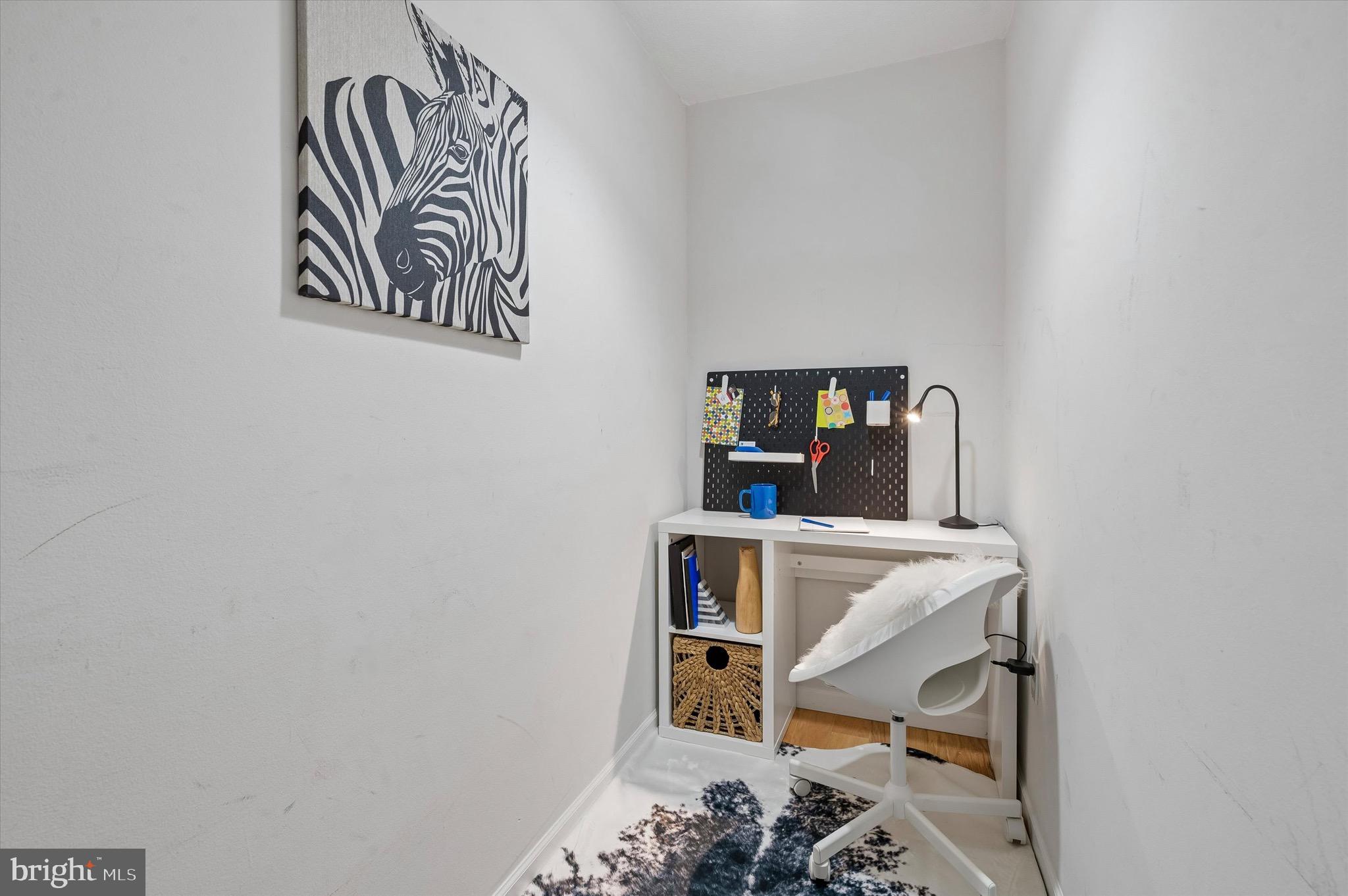 604 South Washington Square, Unit 309 Philadelphia, PA 19106 - Photo 13 of 28 a bed room with a bed and a desk