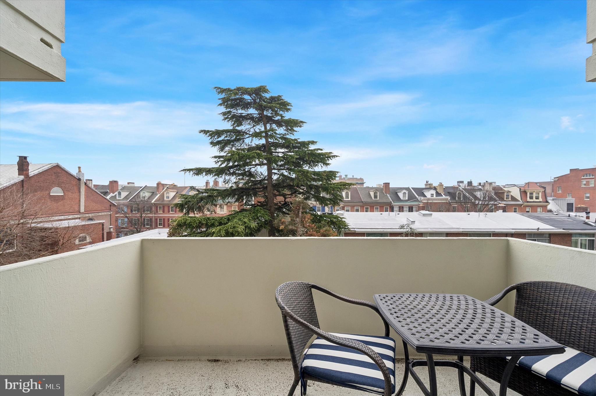 604 South Washington Square, Unit 309 Philadelphia, PA 19106 - Photo 16 of 28 a view of city from terrace with seating space