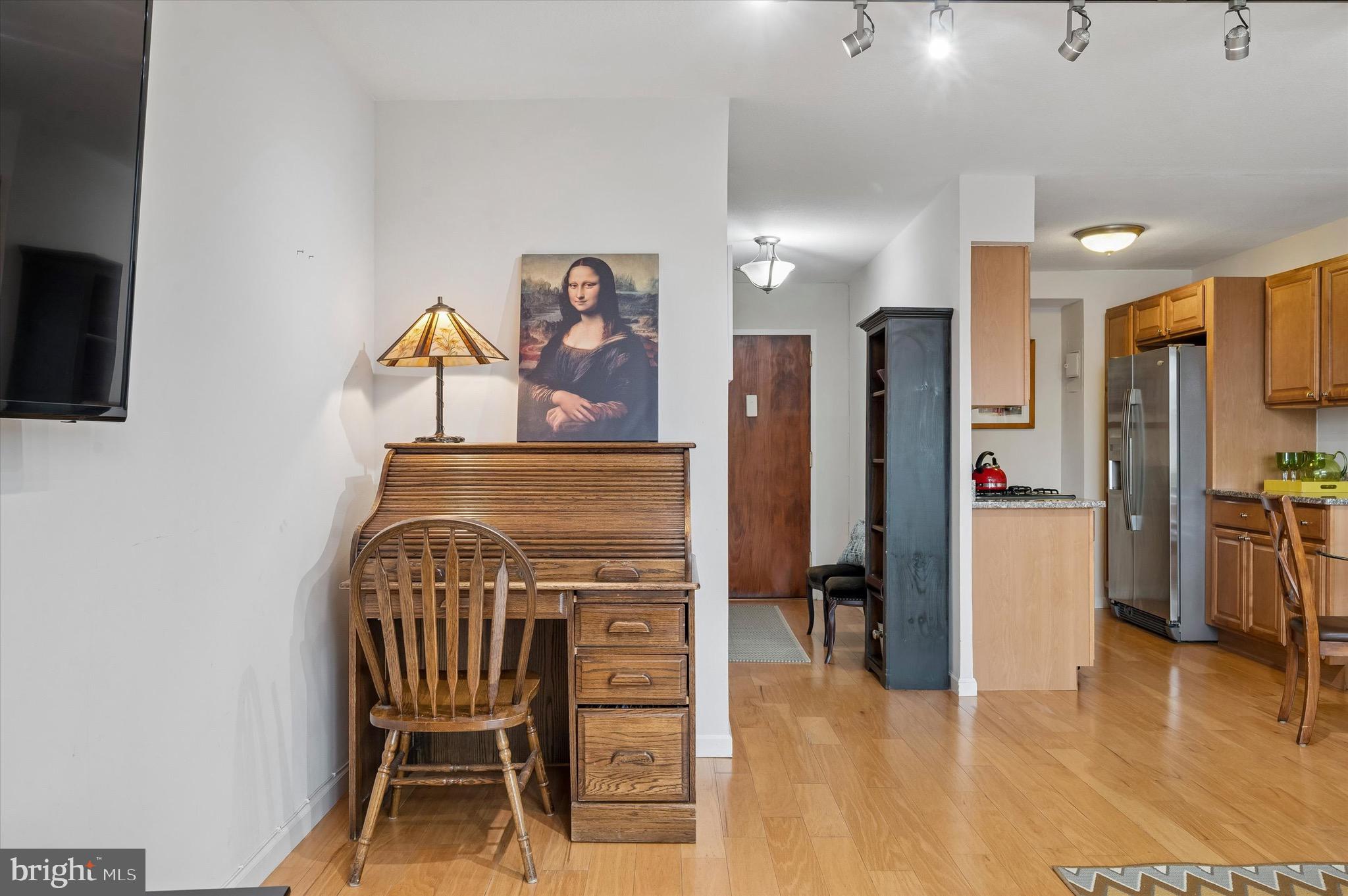 604 South Washington Square, Unit 309 Philadelphia, PA 19106 - Photo 5 of 28 a view of a livingroom with furniture and a flat screen tv