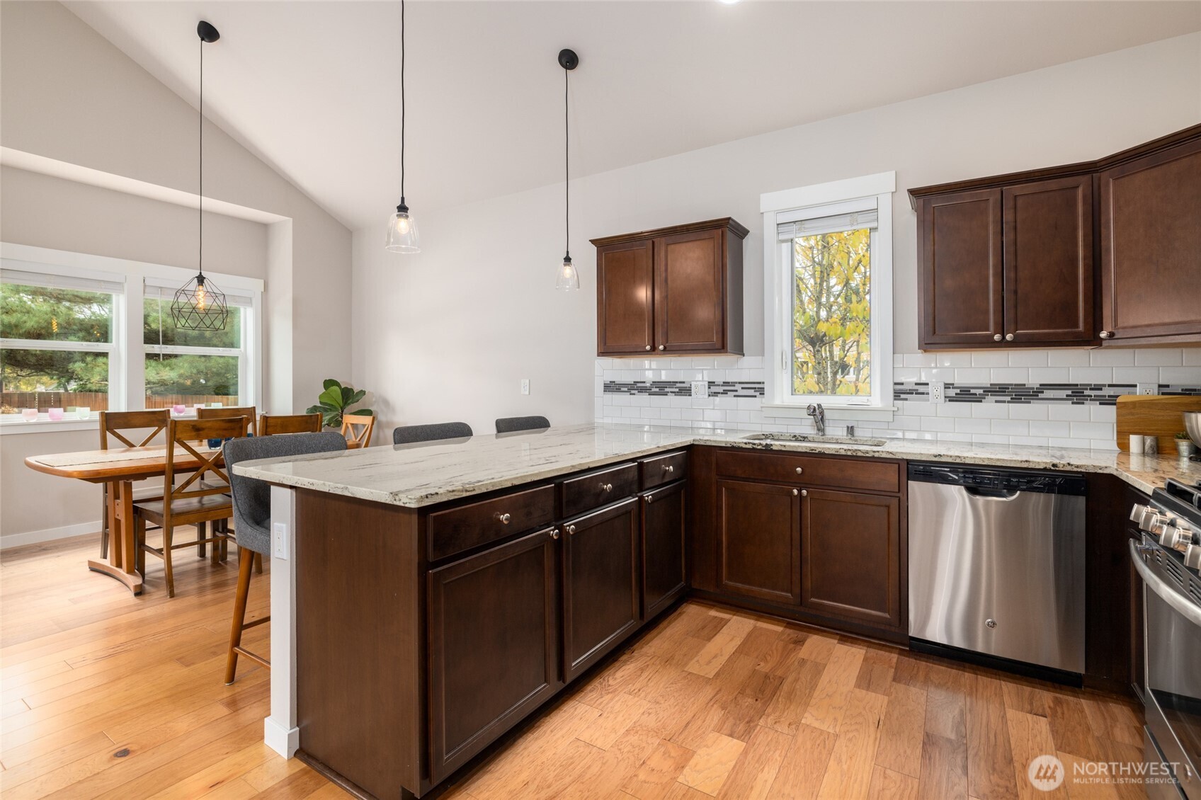 1107 Harmony Lane Mount Vernon, WA 98274 - Photo 16 of 27 a kitchen with a sink cabinets and wooden floor