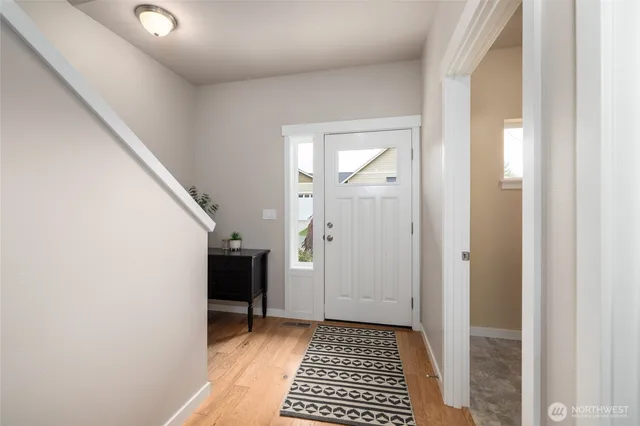 a view of an entryway with a rug