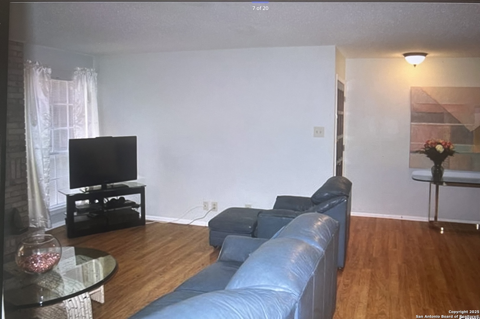 2300 Nacogdoches Road, Unit 263R San Antonio, TX 78209 - Photo 6 of 19 a living room with furniture and a flat screen tv