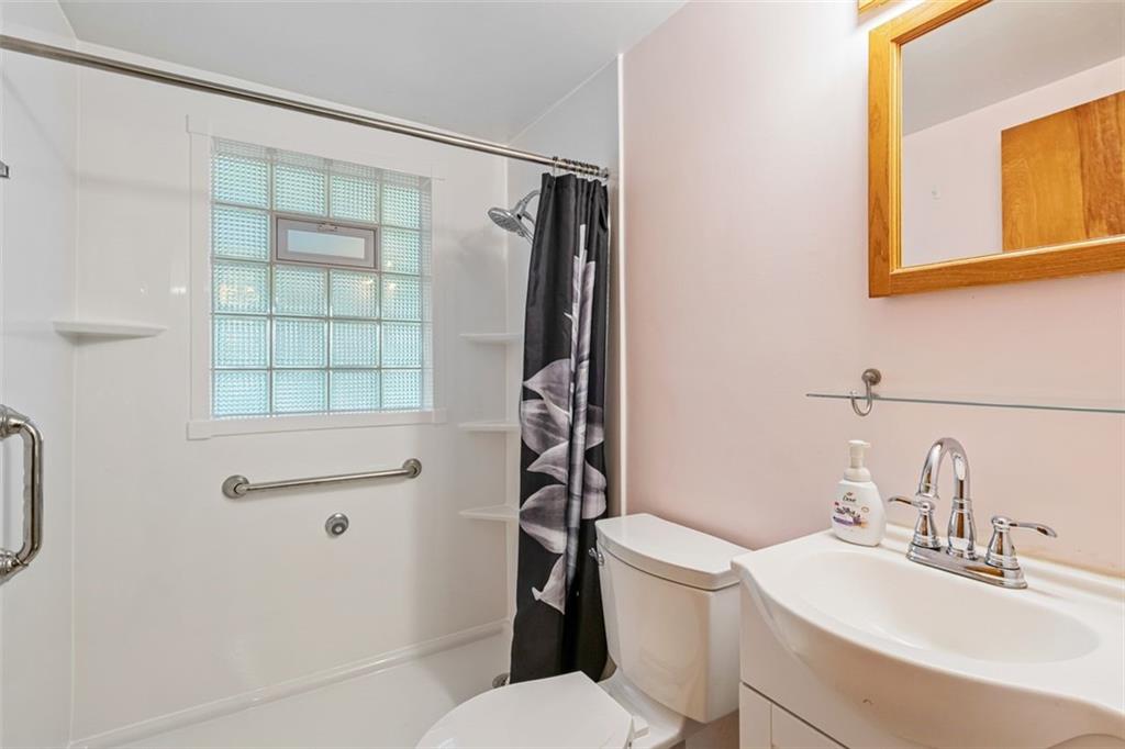 223 Washington Avenue Homestead, PA 15120 - Photo 18 of 31 a bathroom with a sink toilet and shower