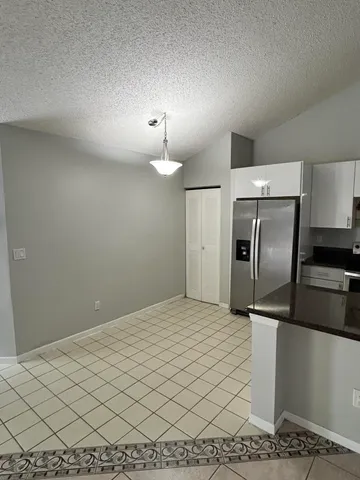 a view of a kitchen with a sink
