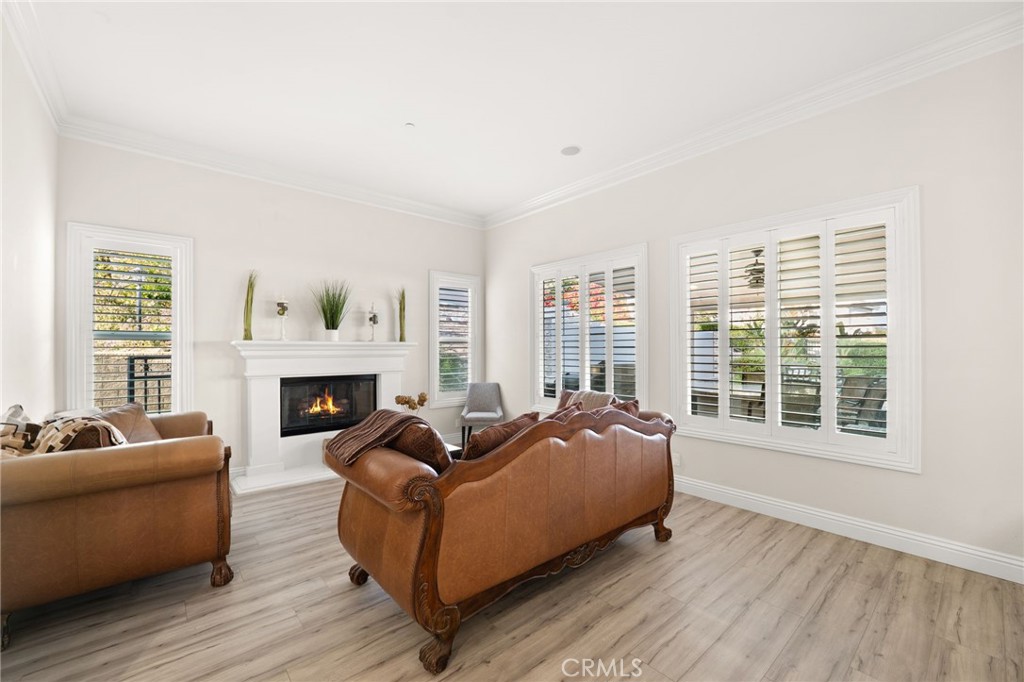 4947 Palomino Place Rancho Cucamonga, CA 91737 - Photo 18 of 53 a living room with furniture and a fireplace