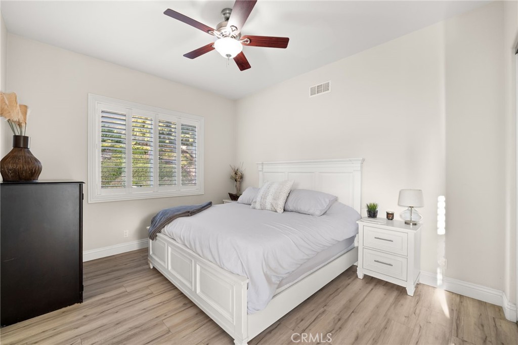 4947 Palomino Place Rancho Cucamonga, CA 91737 - Photo 19 of 53 a bedroom with a large bed and a window