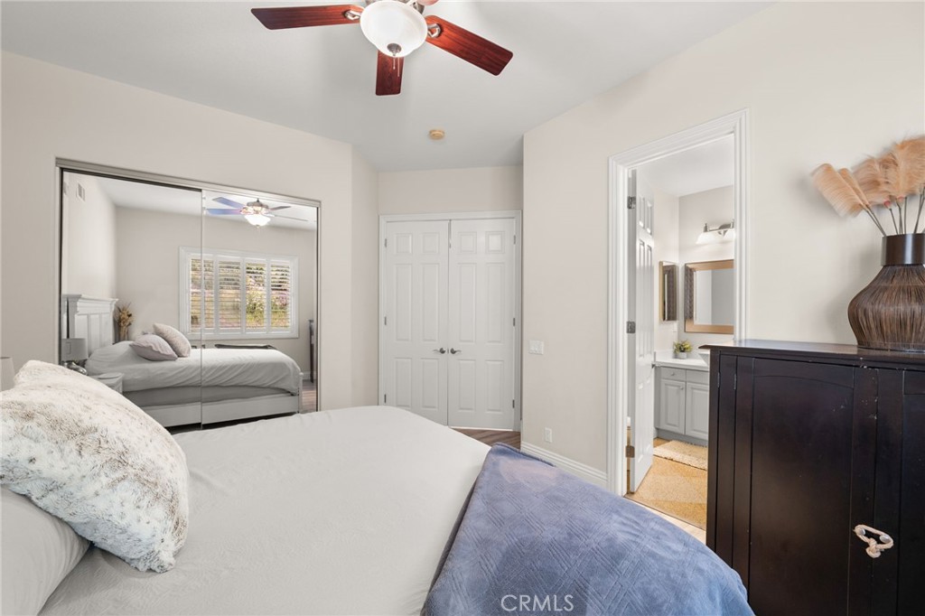 4947 Palomino Place Rancho Cucamonga, CA 91737 - Photo 20 of 53 a bedroom with a bed and wooden floor
