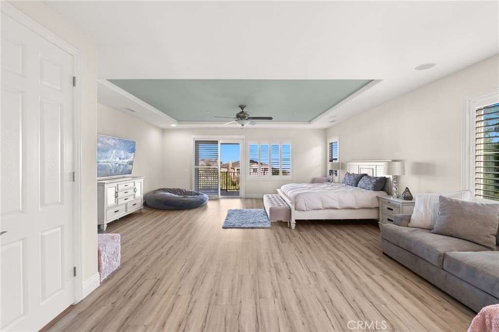 4947 Palomino Place Rancho Cucamonga, CA 91737 - Photo 26 of 53 a bedroom with furniture and a wooden floor