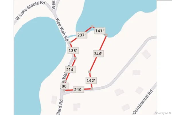 a view of staircase with white walls