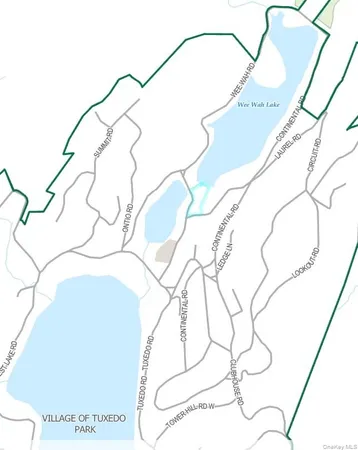 an aerial view of valley and lake