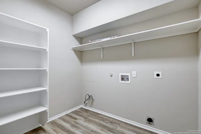 a view of an empty walk in closet