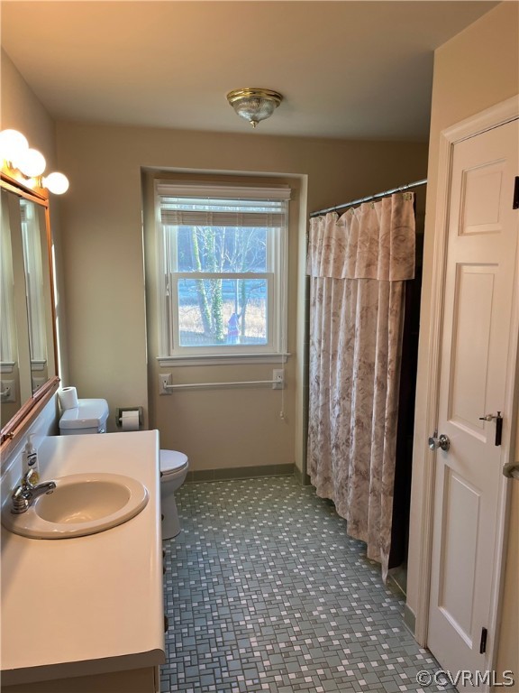 3809 Cresthill Road Chester, VA 23831 - Photo 25 of 44 a bathroom with a sink toilet and shower