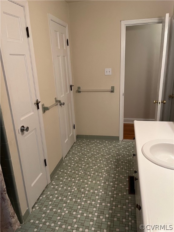 3809 Cresthill Road Chester, VA 23831 - Photo 27 of 44 a bathroom with a granite countertop sink a toilet and a shower