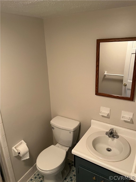 3809 Cresthill Road Chester, VA 23831 - Photo 30 of 44 a bathroom with a sink mirror and toilet