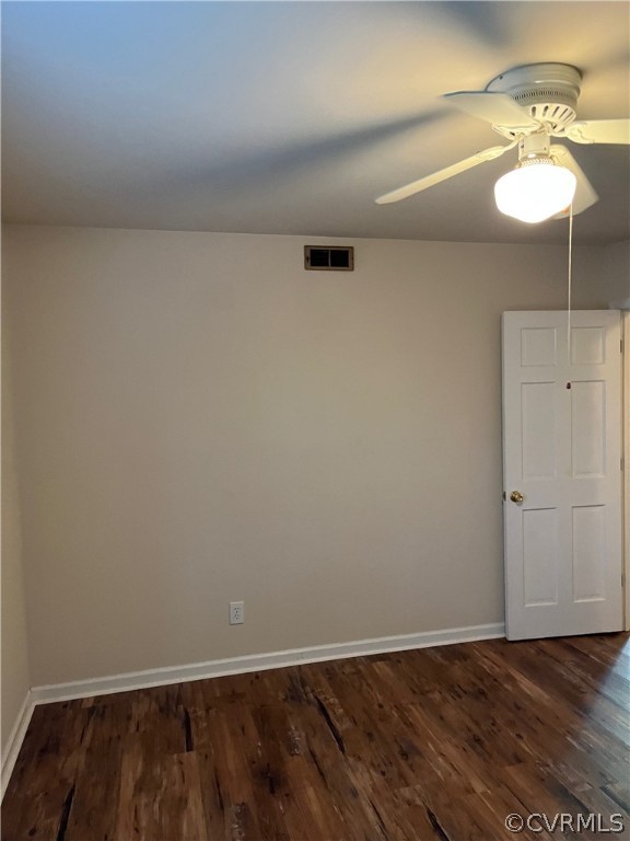 3809 Cresthill Road Chester, VA 23831 - Photo 31 of 44 a view of a room with wooden floor and a ceiling fan