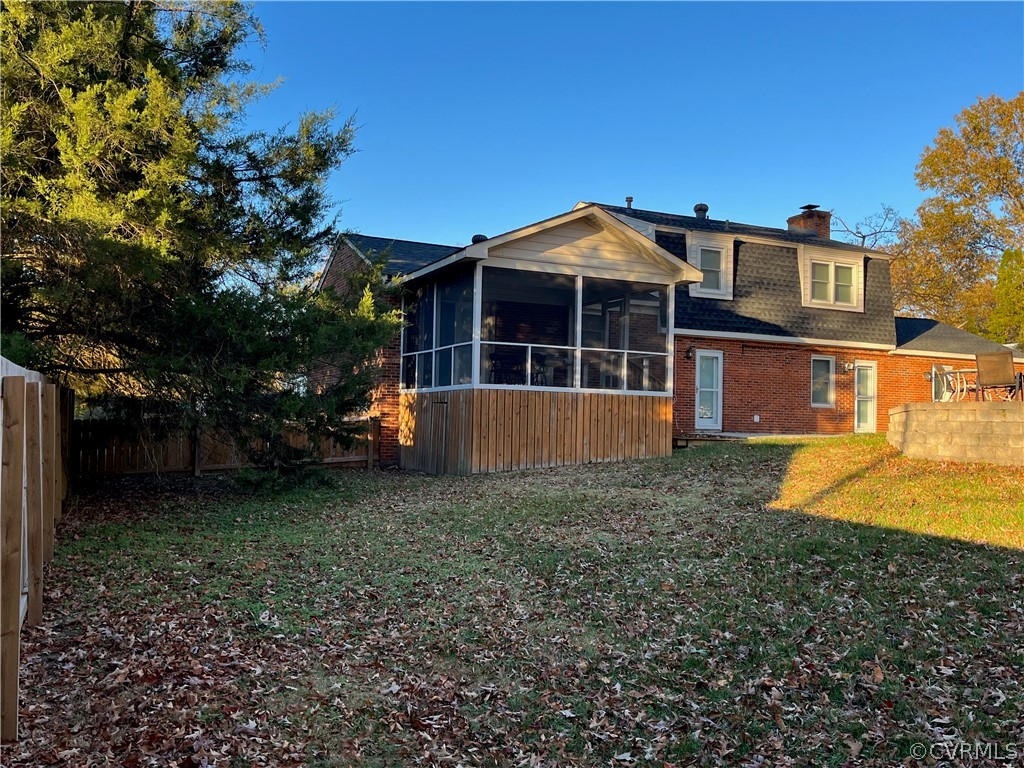 3809 Cresthill Road Chester, VA 23831 - Photo 36 of 44 a view of a house with a backyard and a tree