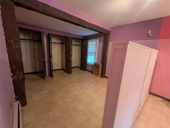 a view of a livingroom with a staircase