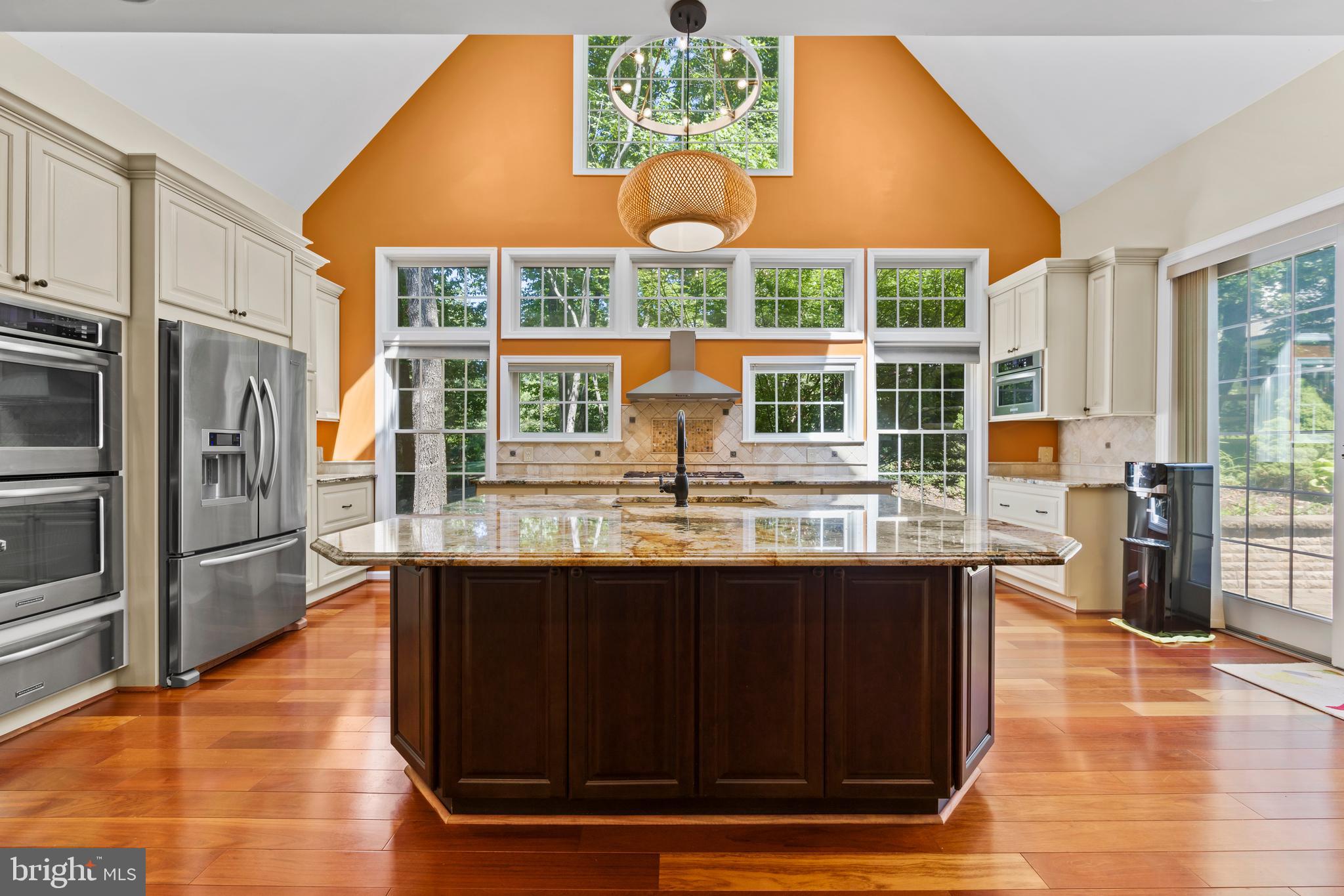 11019 Ring Road Reston, VA 20190 - Photo 16 of 78 a kitchen with stainless steel appliances granite countertop a stove and a refrigerator