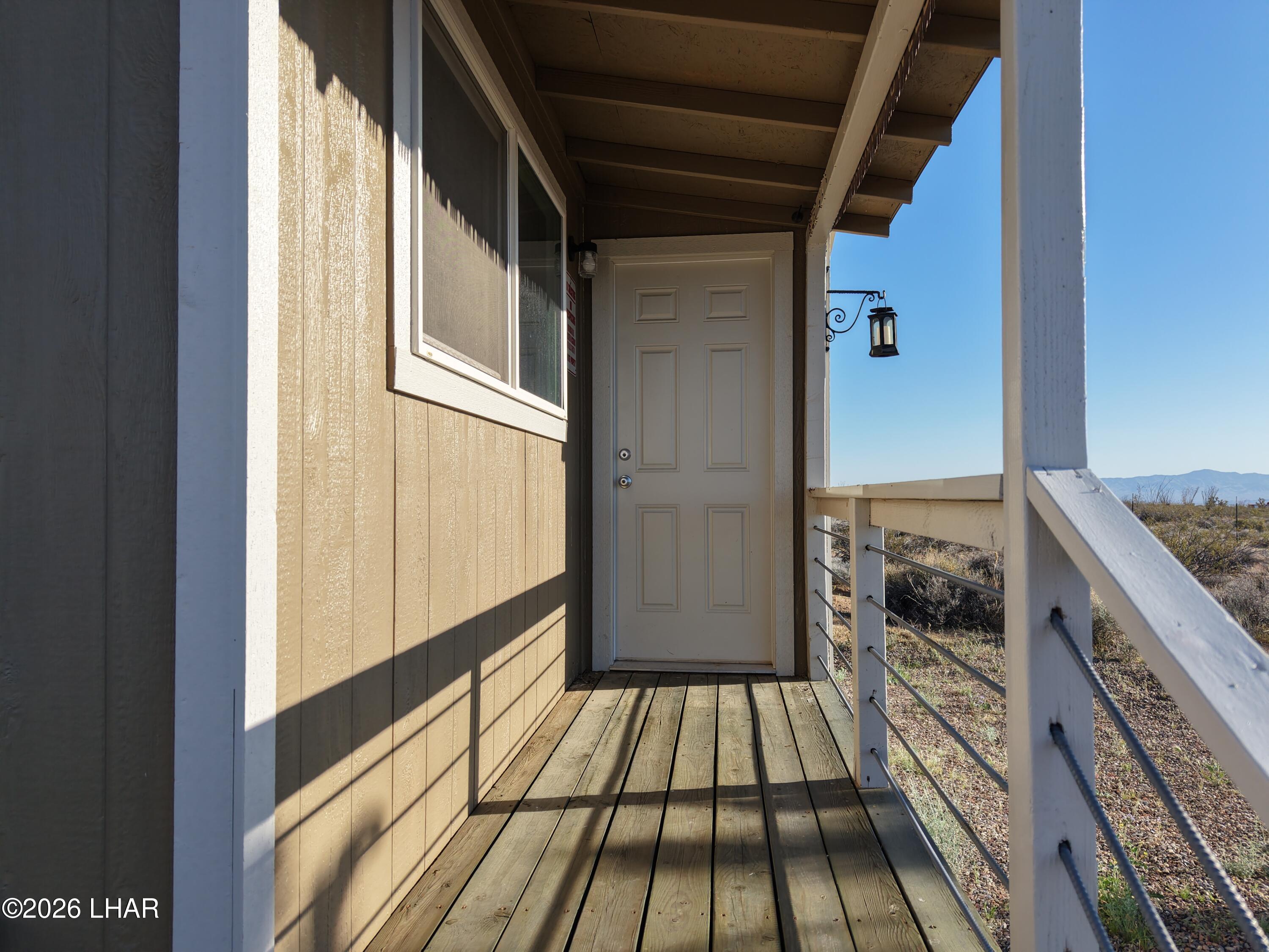 122 South Carrow Road Yucca, AZ 86438 - Photo 22 of 47 a view of balcony