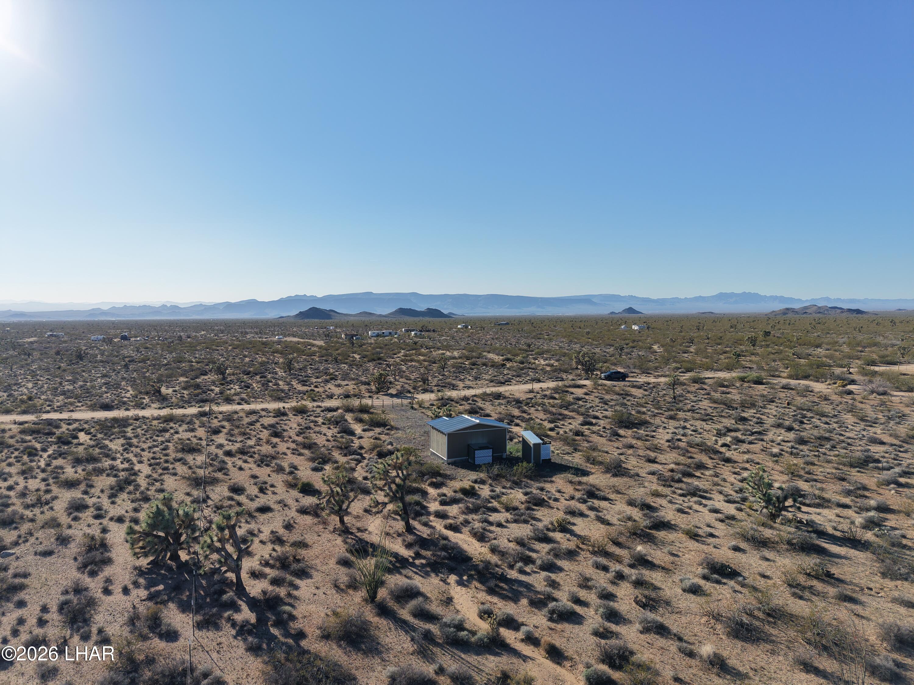 122 South Carrow Road Yucca, AZ 86438 - Photo 37 of 47 an aerial view of multiple house
