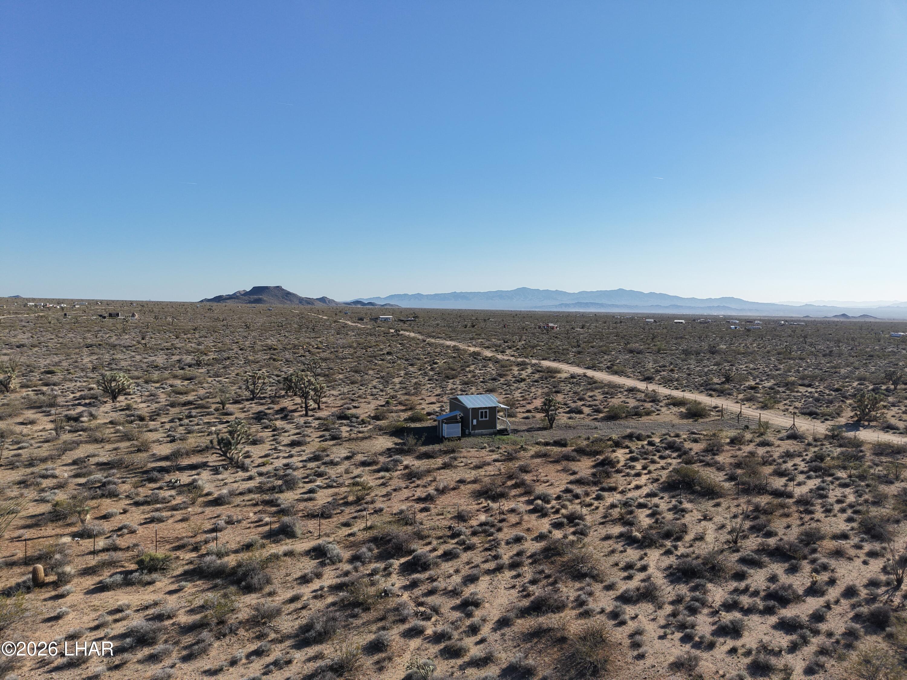 122 South Carrow Road Yucca, AZ 86438 - Photo 40 of 47 an aerial view of houses with city view