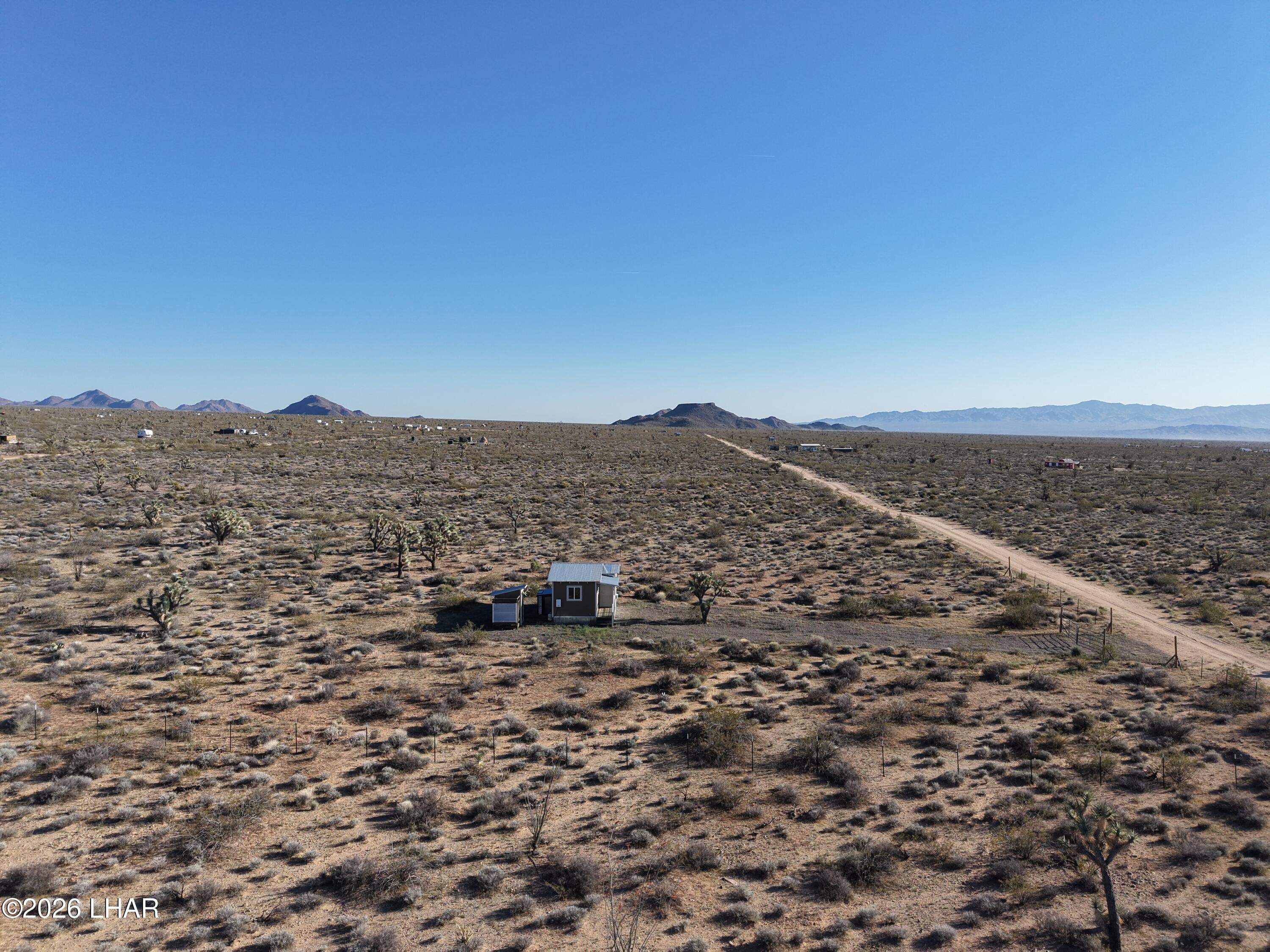 122 South Carrow Road Yucca, AZ 86438 - Photo 41 of 47 a view of outdoor space and mountain view