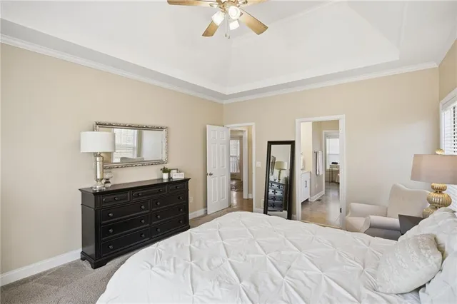 a bed room with a bed and a television