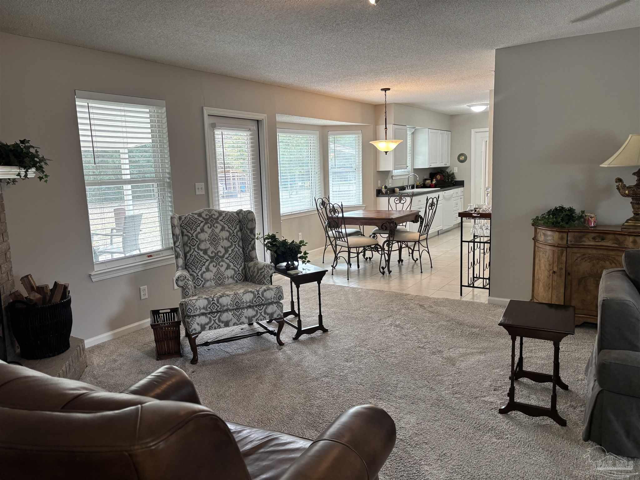 5367 Constitution Road Crestview, FL 32539 - Photo 13 of 29 a living room with furniture and a large window