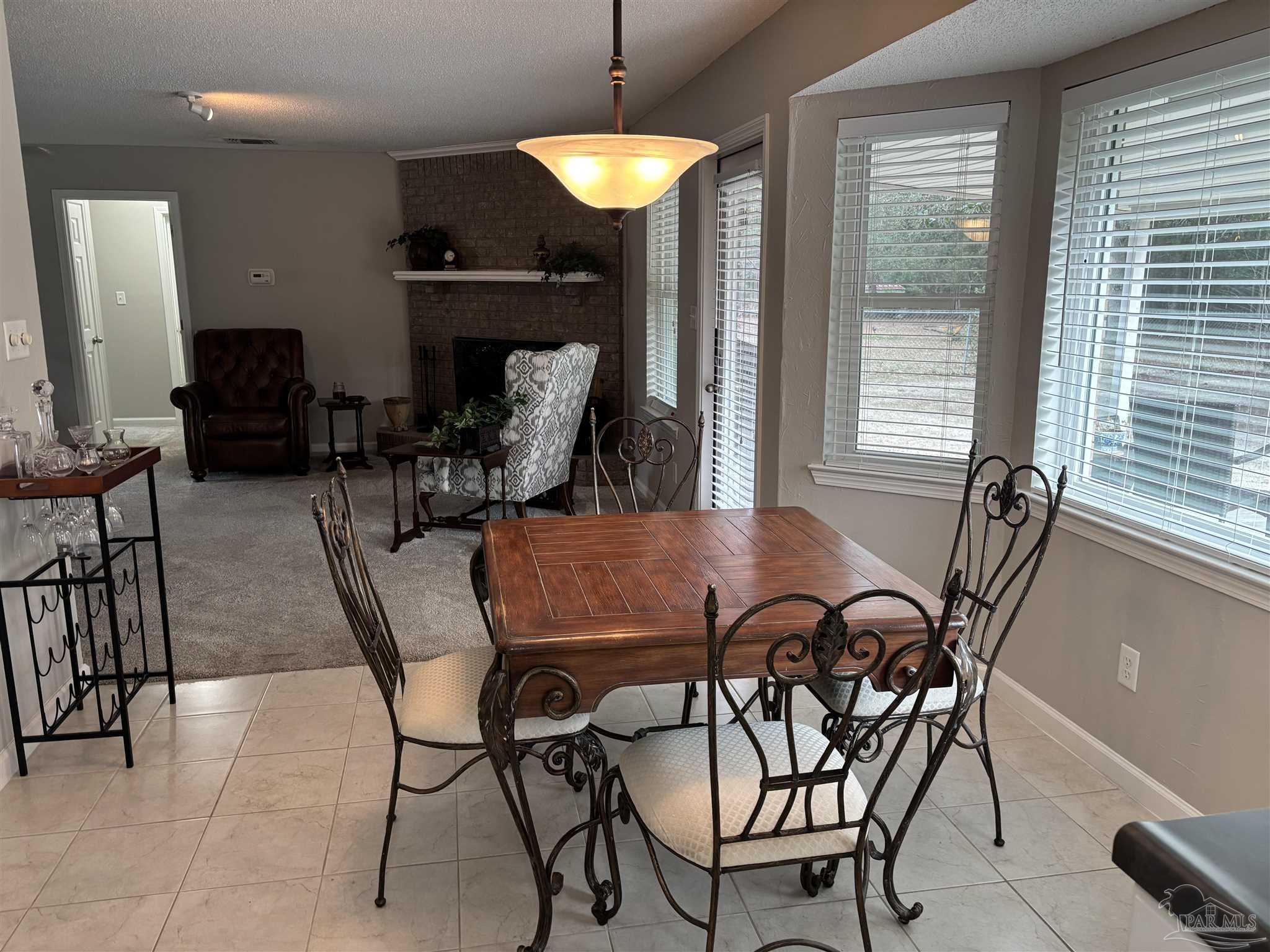 5367 Constitution Road Crestview, FL 32539 - Photo 22 of 29 a dining room with furniture and wooden floor