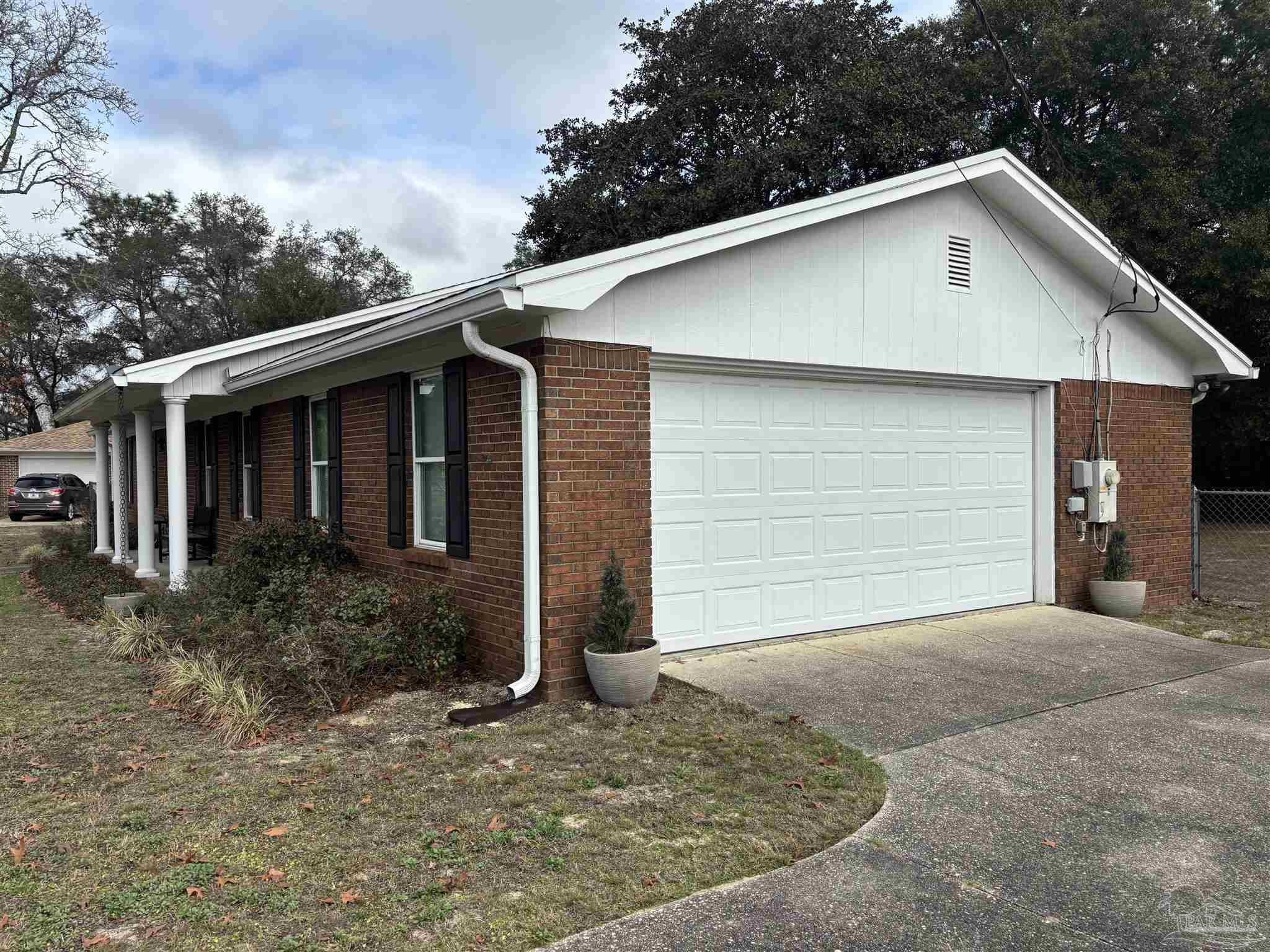 5367 Constitution Road Crestview, FL 32539 - Photo 3 of 29 a front view of a house with garage