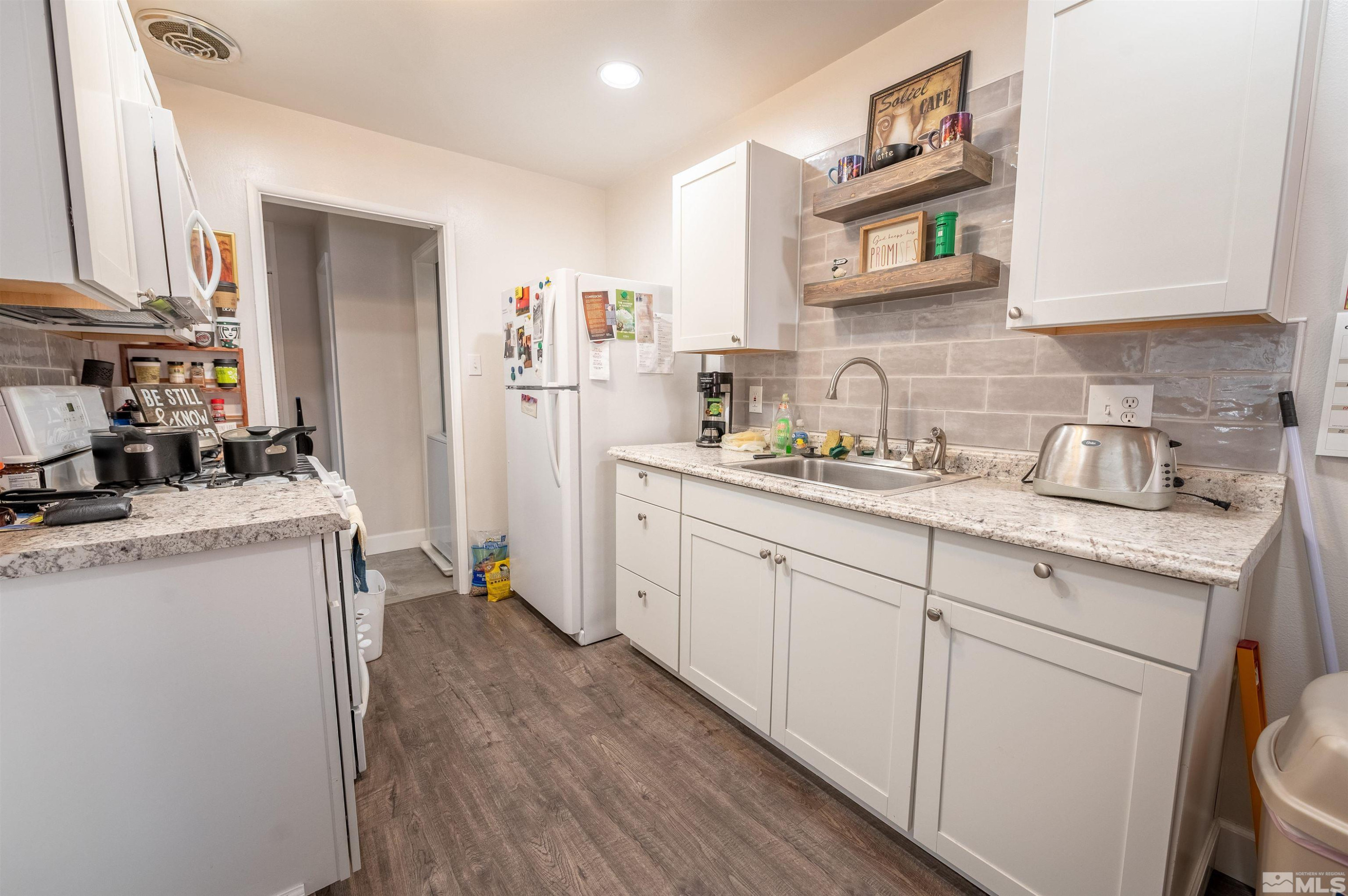 282 Mt Rose Street Reno, NV 89509 - Photo 20 of 22 a room with cabinets a washer and dryer