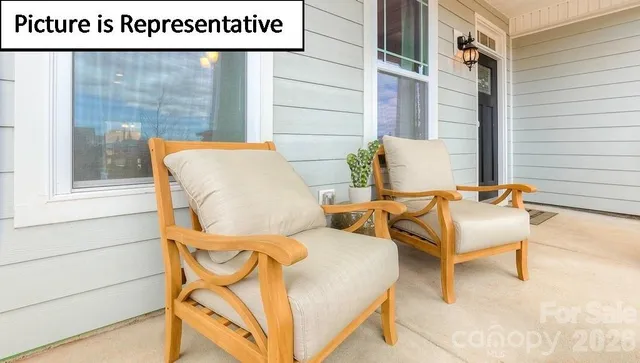 a couple of chairs sitting in front of a door