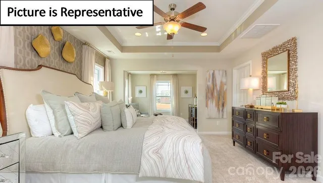 a living room with furniture and a gate