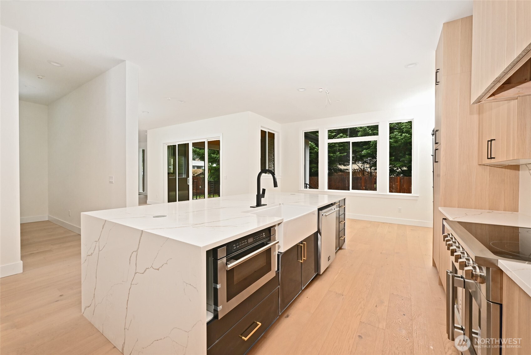 17526 Fremont Avenue North Shoreline, WA 98133 - Photo 14 of 40 a room with a sink and large window