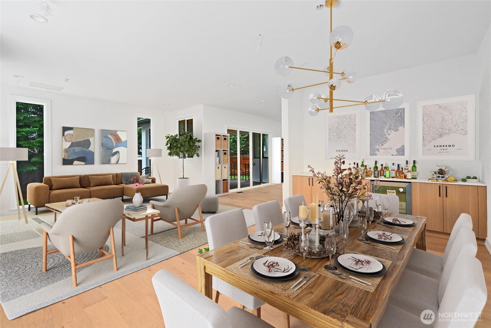 17526 Fremont Avenue North Shoreline, WA 98133 - Photo 17 of 40 a view of a dining room and livingroom view with furniture wooden floor a chandelier