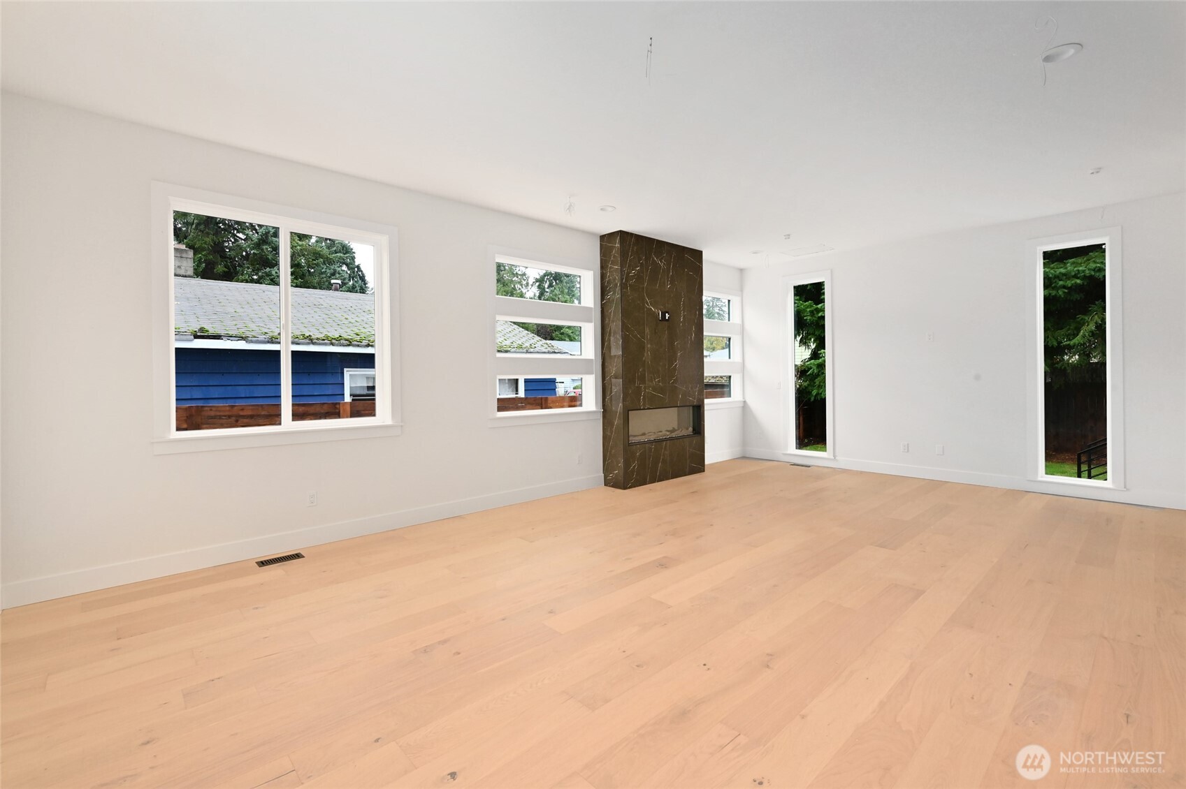 17526 Fremont Avenue North Shoreline, WA 98133 - Photo 19 of 40 a view of an empty room with closet and window
