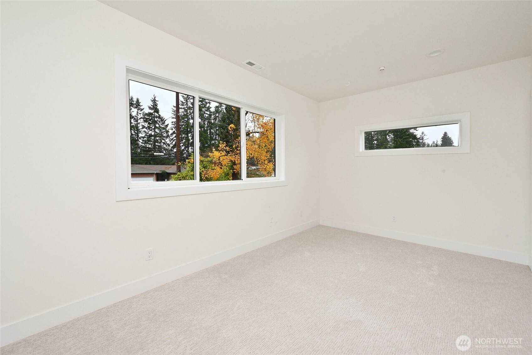 17526 Fremont Avenue North Shoreline, WA 98133 - Photo 35 of 40 an empty room with a window