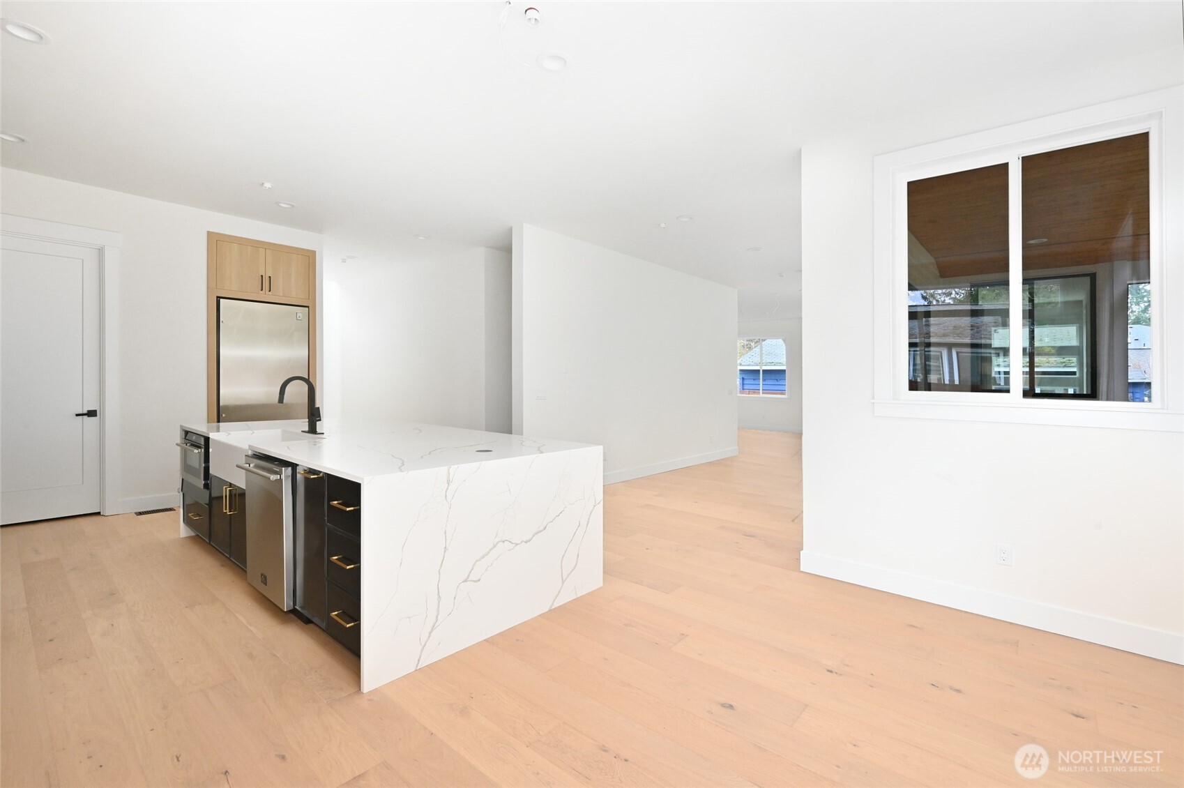 17526 Fremont Avenue North Shoreline, WA 98133 - Photo 10 of 40 a kitchen with stainless steel appliances a stove and a refrigerator