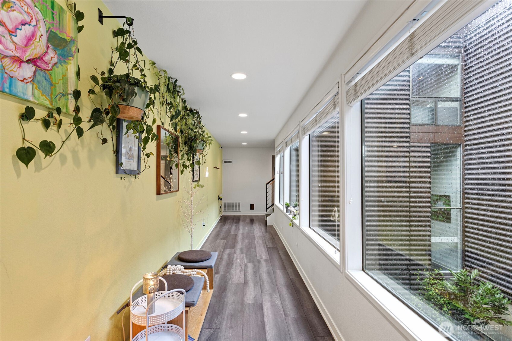 611 State Street, Unit 9 Kirkland, WA 98033 - Photo 16 of 36 a view of a house with wooden floor