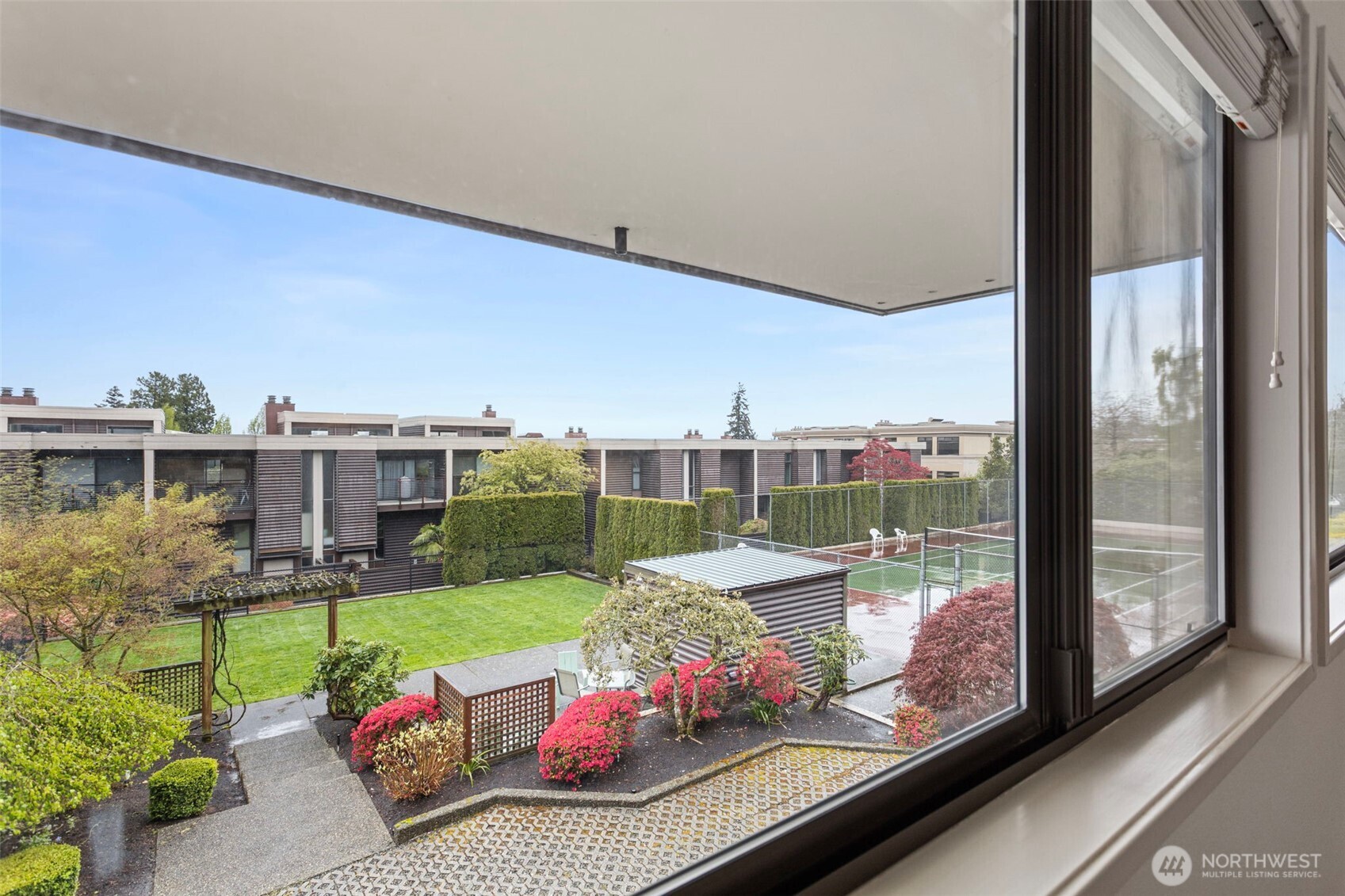 611 State Street, Unit 9 Kirkland, WA 98033 - Photo 17 of 36 a view of a balcony with couches and wooden floor