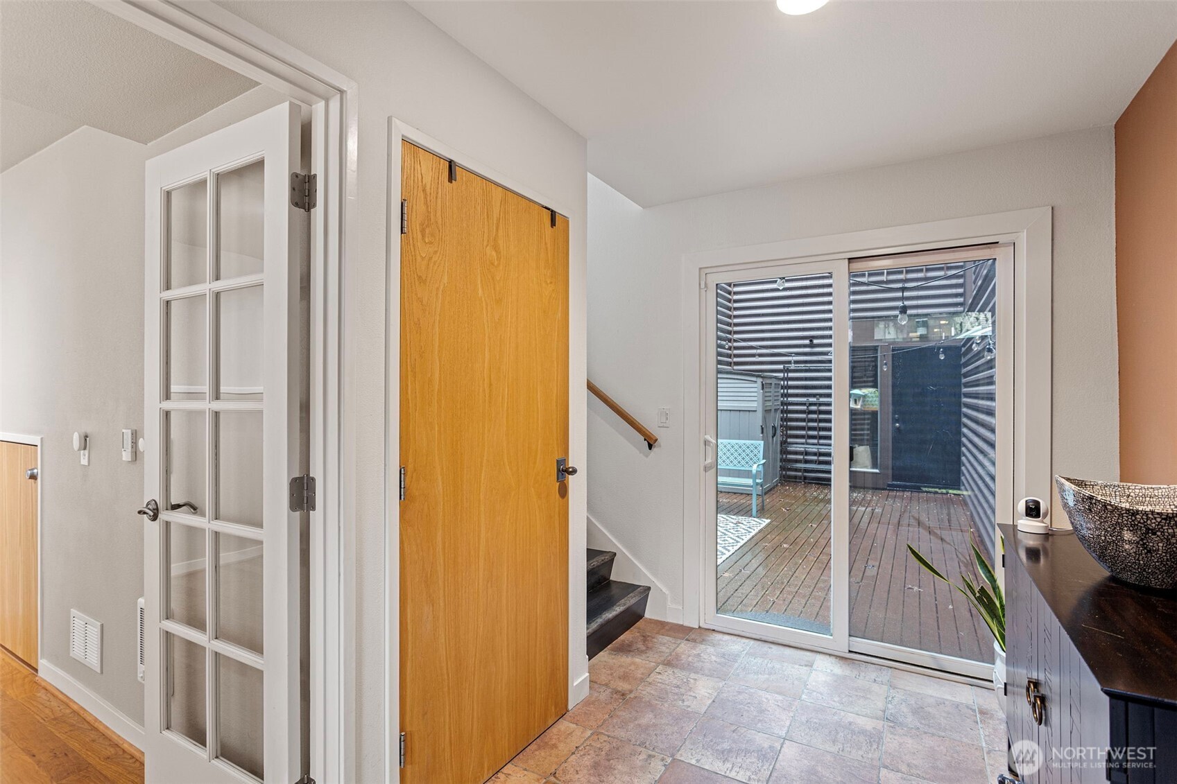 611 State Street, Unit 9 Kirkland, WA 98033 - Photo 26 of 36 a view of a door and chair in a room