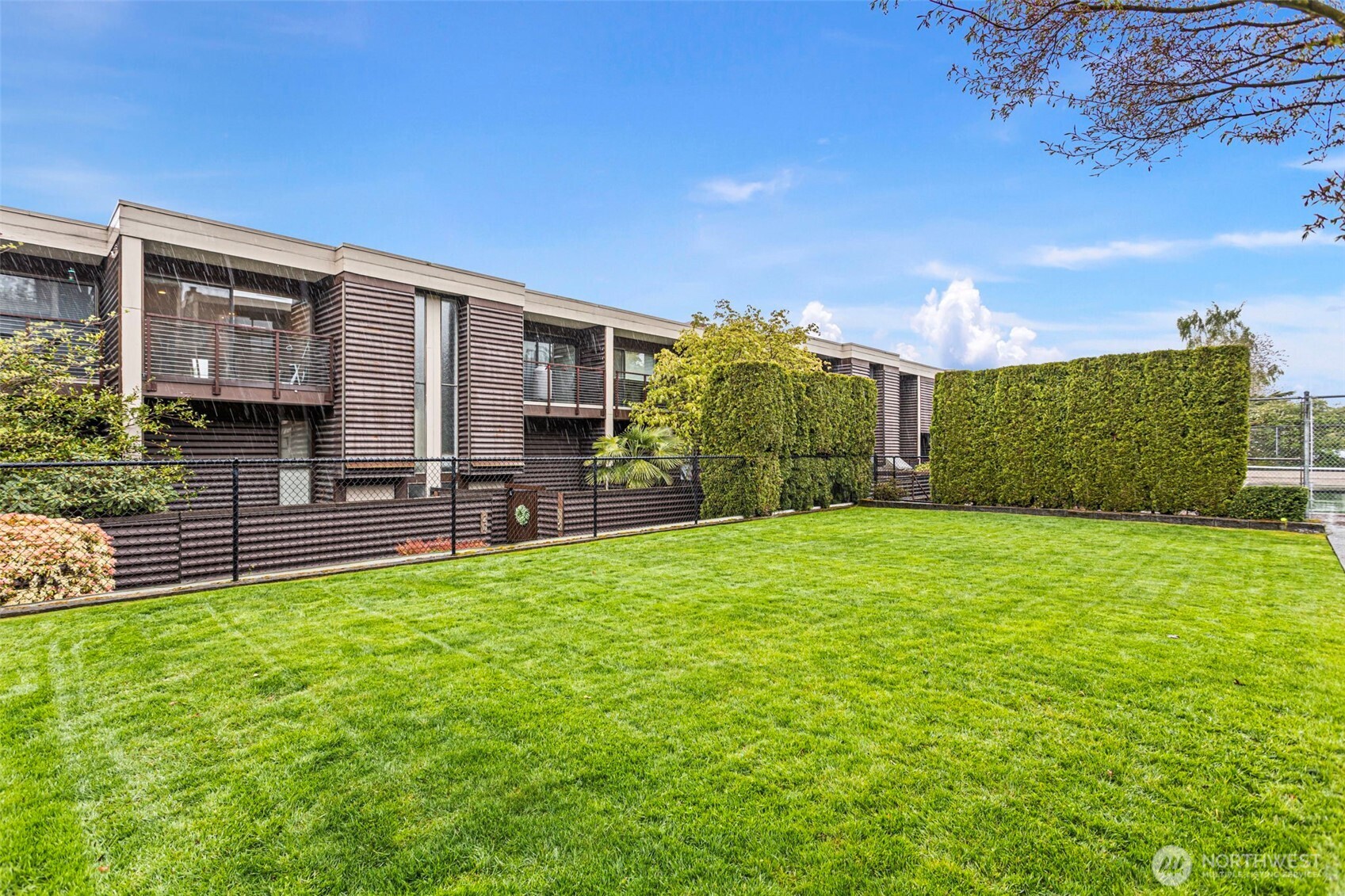 611 State Street, Unit 9 Kirkland, WA 98033 - Photo 35 of 36 a view of a house with a yard